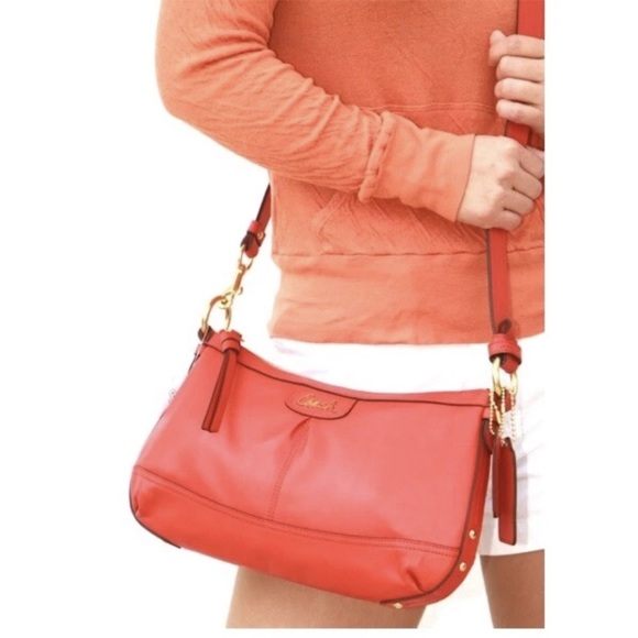 Coach Handbags - Coach Park Leather East/West Duffle in the color Persimmon